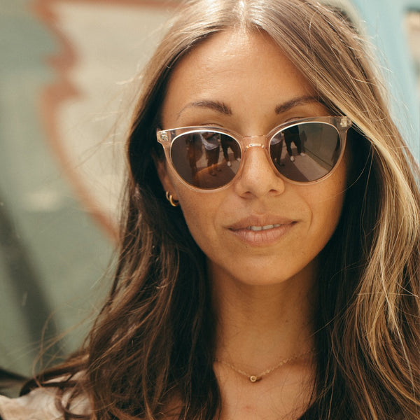Woman wearing crystal cat eye sunglasses 