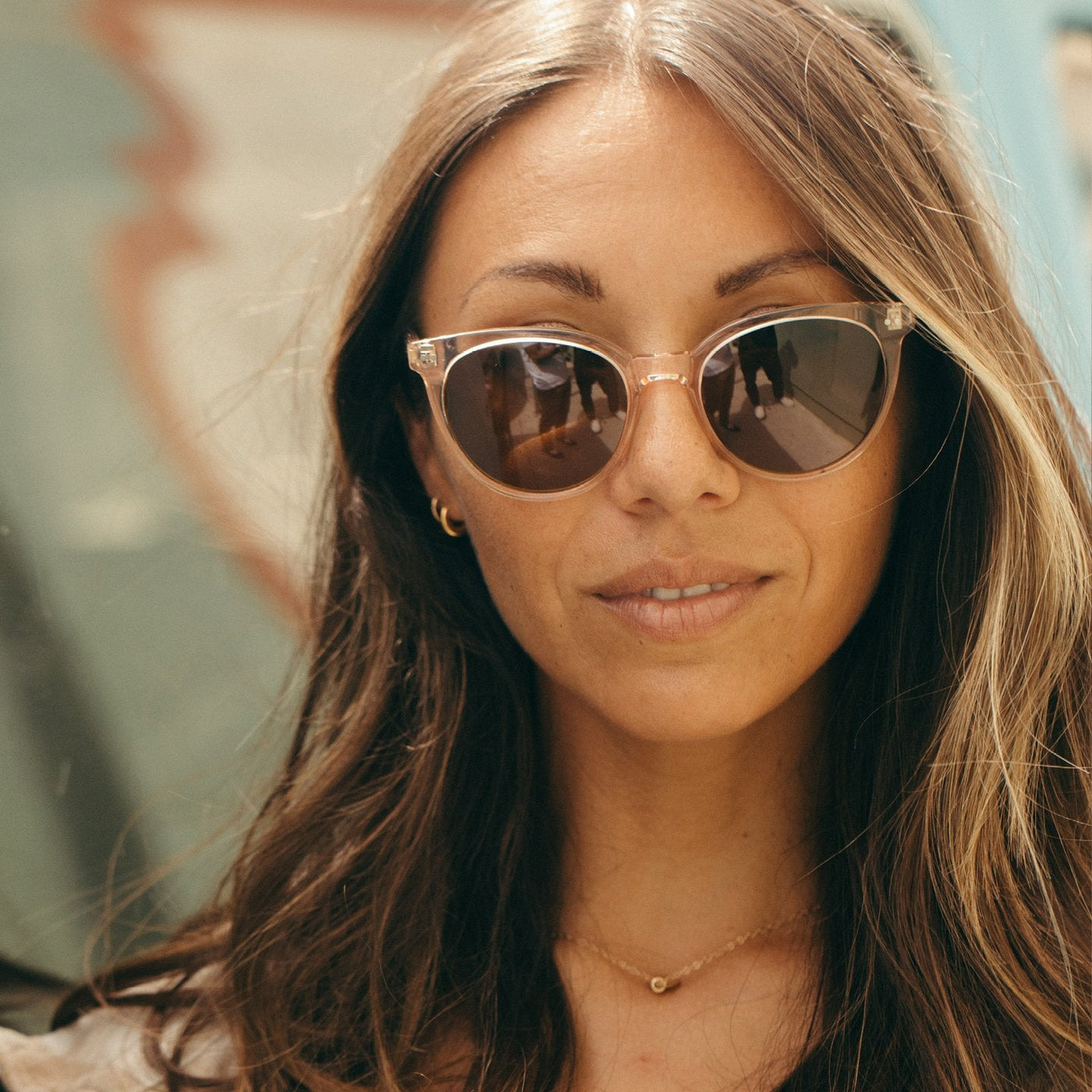 Woman wearing crystal cat eye sunglasses 