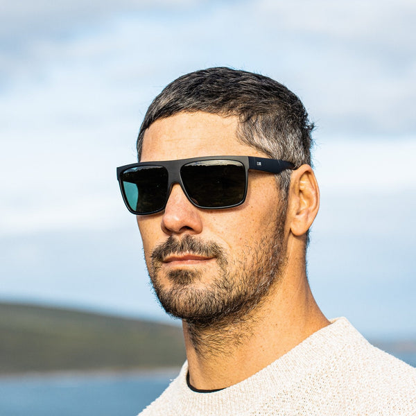 Jay Davies wearing black OTIS Eyewear sunglasses 